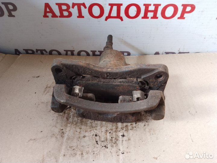 Суппорт тормозной задний правый Mitsubishi Galant