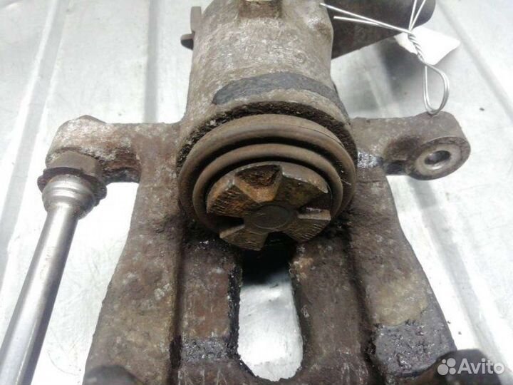 Суппорт тормозной задний левый Renault Megane 3