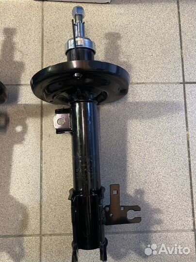 Амортизатор передний Opel Astra H