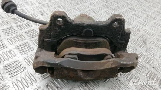 Суппорт тормозной передний левый opel corsa D (91O