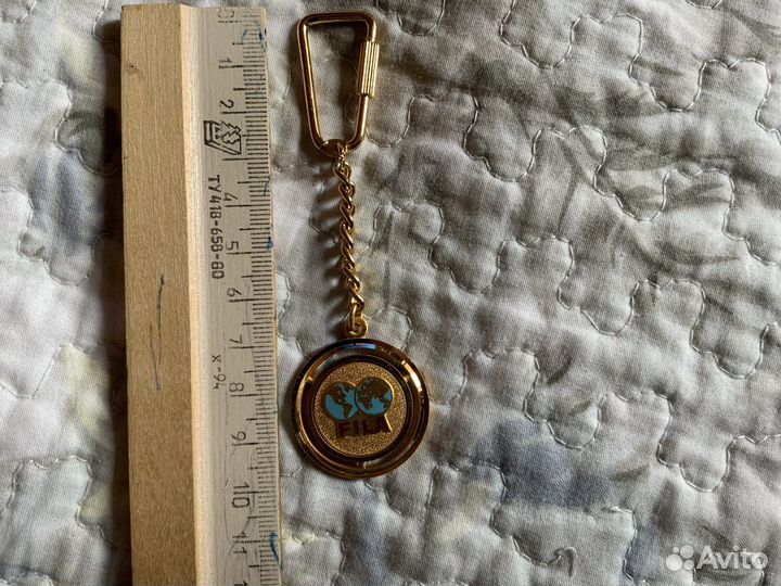 Офиц. брелок Международной Федерации борьбы fila