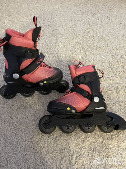 Роликовые коньки