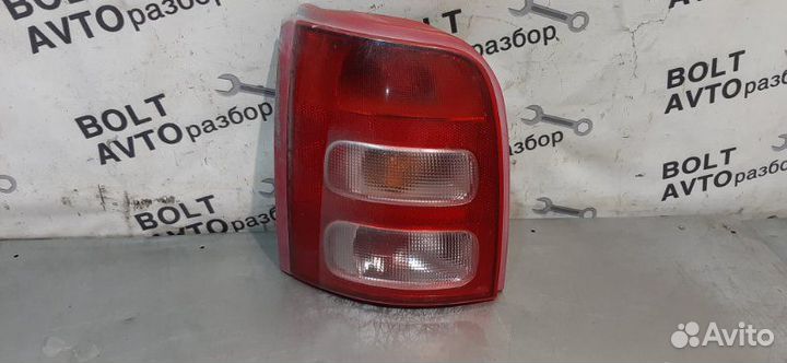 Фонарь (стоп-сигнал) задний левый Nissan Micra K11