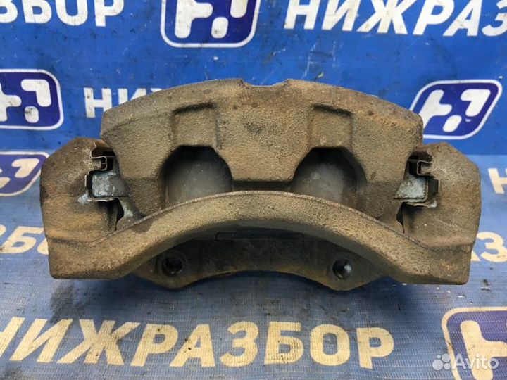 Суппорт передний правый Nissan X-Trail T30 2.0