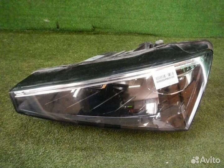 Фара левая Skoda Rapid