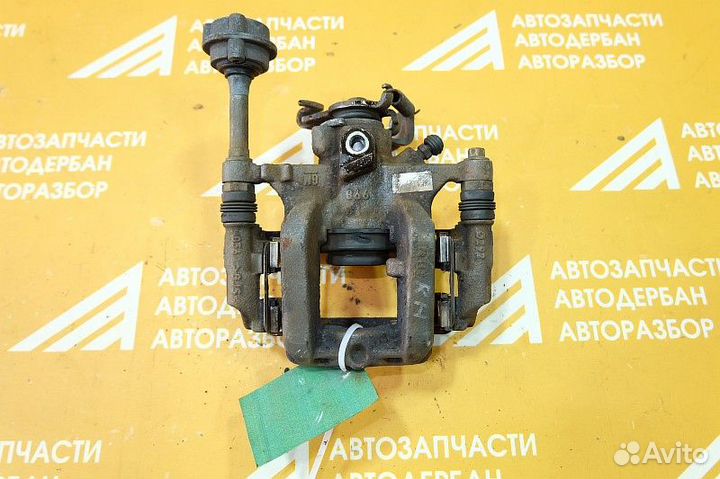 Суппорт тормозной задний правый Opel Astra J