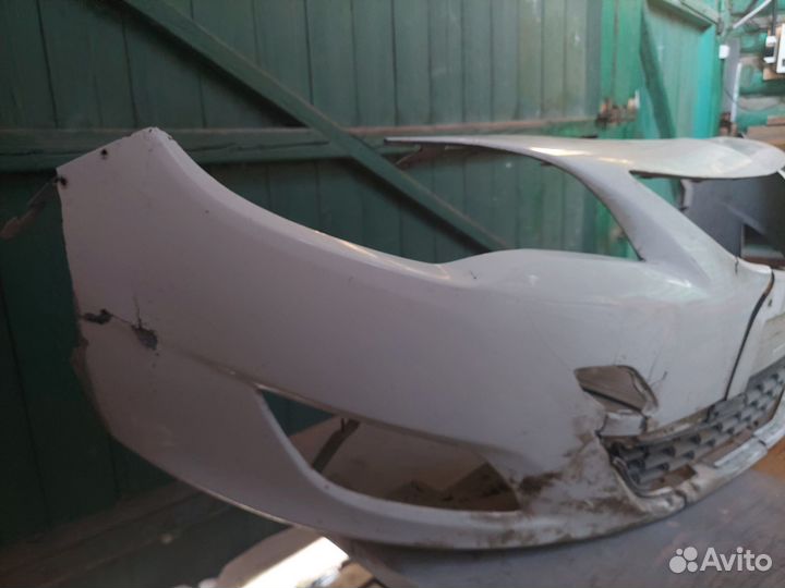 Передний бампер опель астра j