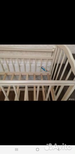 Детская кроватка с поперечным маятником