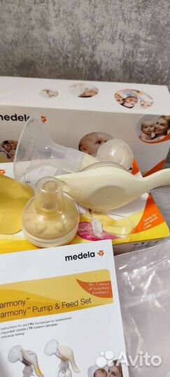 Молокоотсос medela ручной