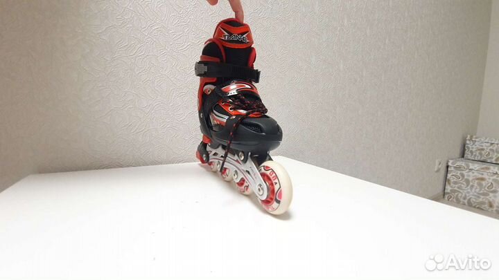 Роликовые коньки