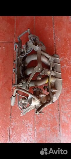 Выпускной коллектор на kia spectra 2006 года