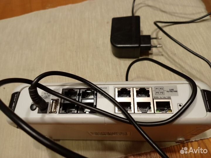 Абонентский voip-шлюз RG-1404GF-W