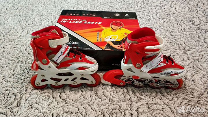 Роликовые коньки