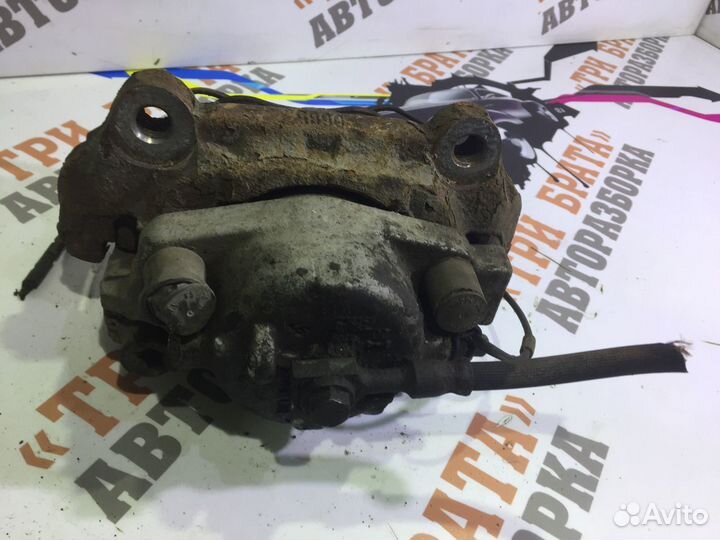 Опель Вектра Суппорт передний Лев