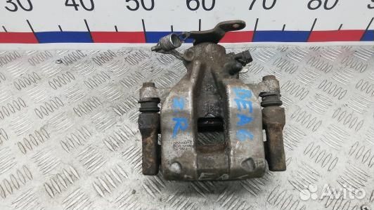 Суппорт тормозной задний правый toyota avensis T27