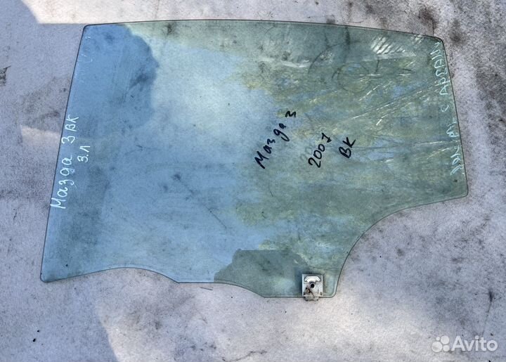 Стекло двери заднее левое Mazda 3 BK