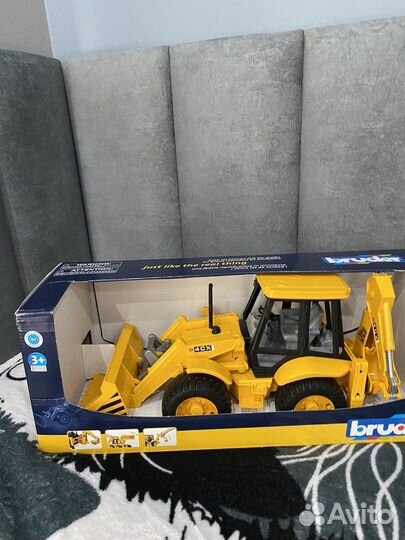 Bruder бульдозер экскаватор JCB 4CX (02-428)