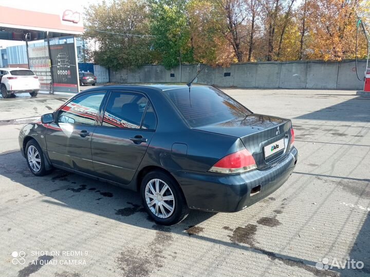 Mitsubishi Lancer 1.3 МТ, 2003, 350 000 км