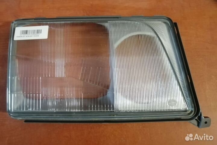 Стекло фары mercedes w124 A1248205666 Hella
