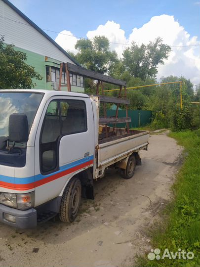 Nissan Atlas бортовой, 2003