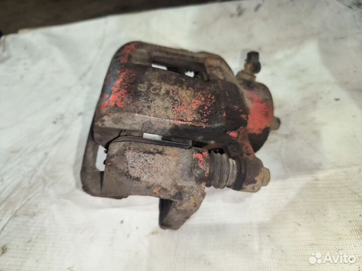 Передний правый суппорт Chevrolet Lacetti