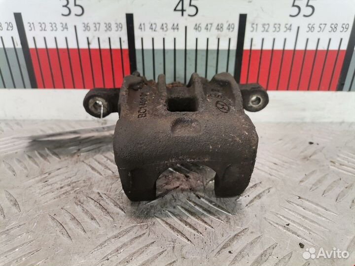 Суппорт задний левый Hyundai i20 PB 2010