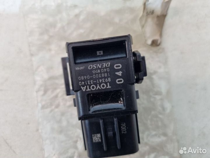 Датчик парковки (парктроник) передний Toyota Land