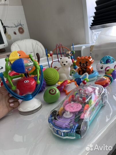 Игрушки погремушки тактилики развивающие