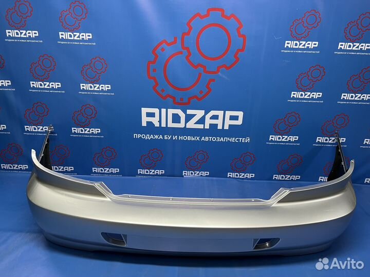 Бампер задний Kia Spectra