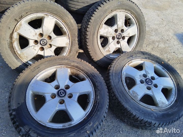 Dunlop 205/60 R16 на дис Mazda 5*114.3