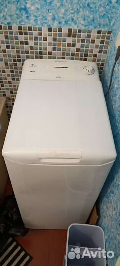 Стиральная машина с вертикальной загрузкой