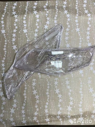 Новые стекла фар Mitsubishi Outlander XL Дорестайл