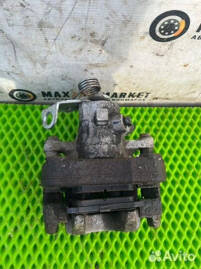 Суппорт тормозной задний левый Peugeot 308