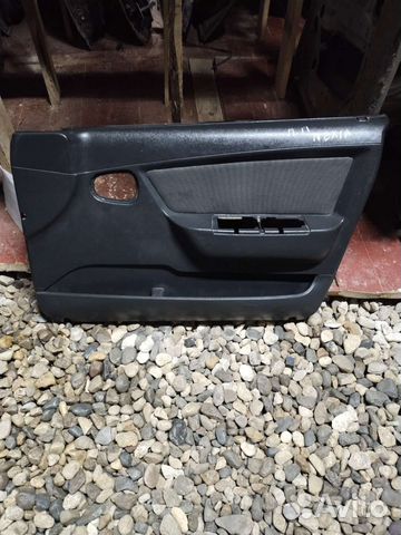 Обшивка двери передней правой Daewoo Nexia