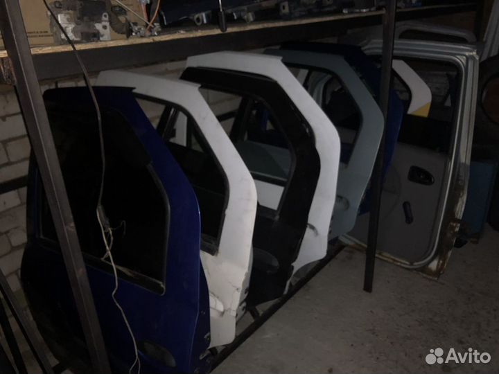 Дверь рено логан