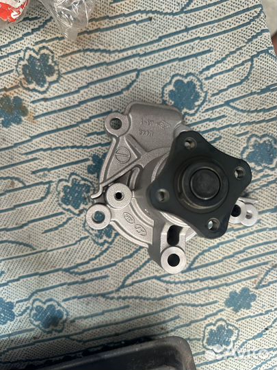 Помпа водянная Hyundai/Kia 25100-23022