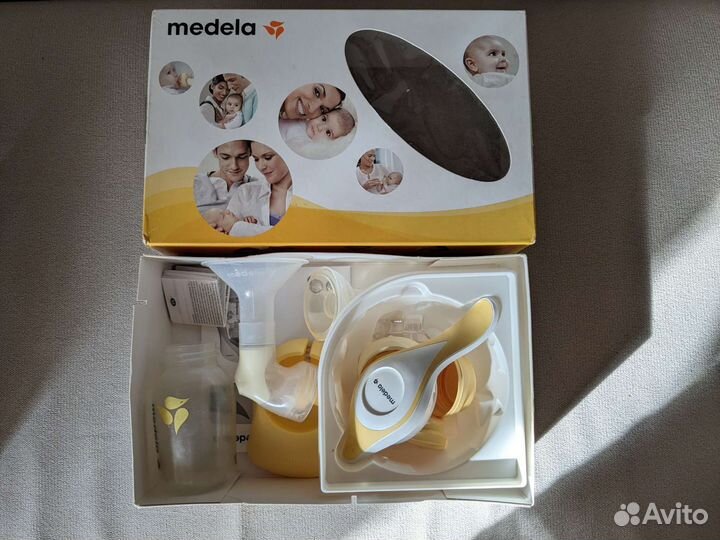 Молокоотсос medela
