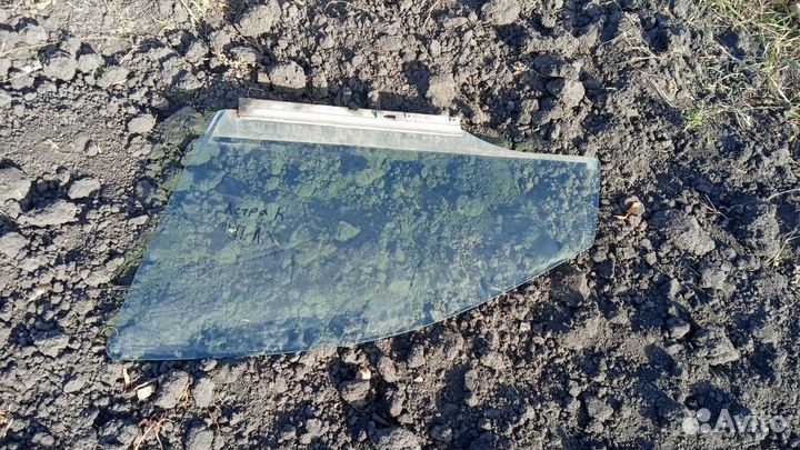 Стекло двери передней левой Opel Astra