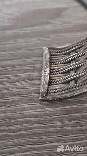 Женский плетеный браслет серебрённый