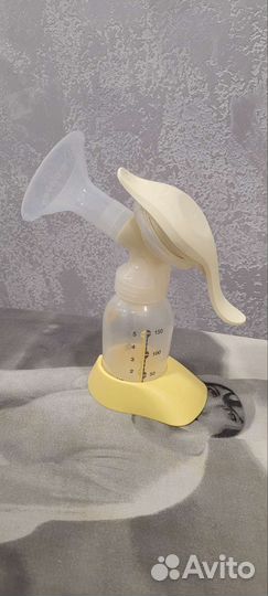 Молокоотсос medela ручной