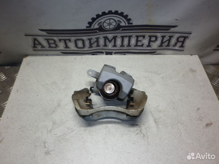 Суппорт тормозной Toyota Prius 40 Alpha / V / +