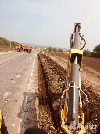 Аренда экскаватора-погрузчика Hew Holland