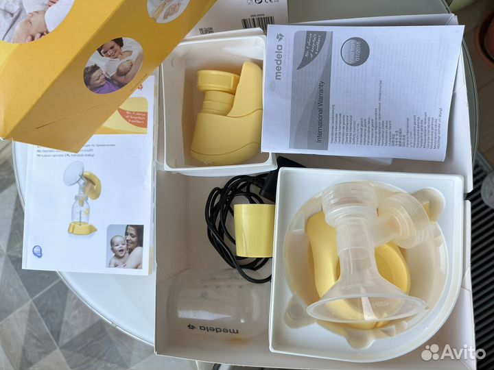Молокоотсос medela mini electric электрический