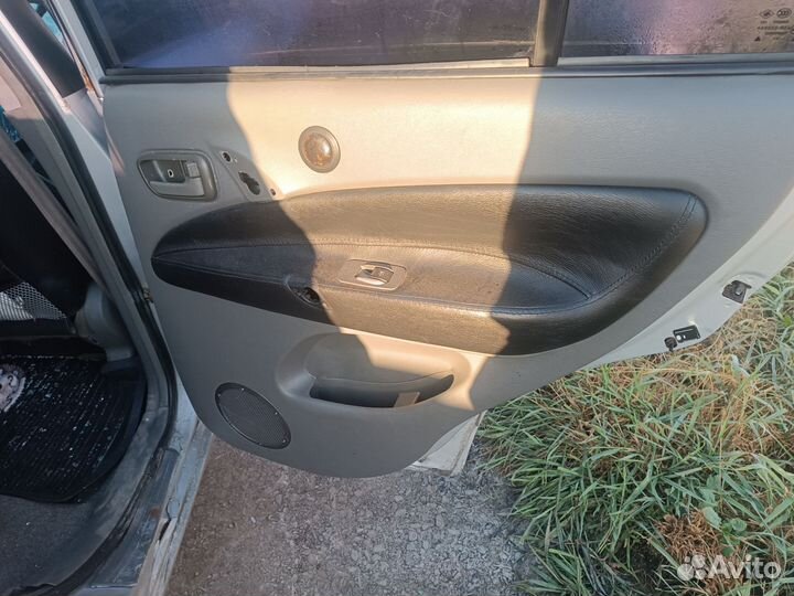 Обшивки двери chery tiggo