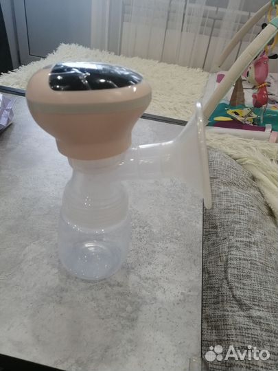 Молокоотсос электрический