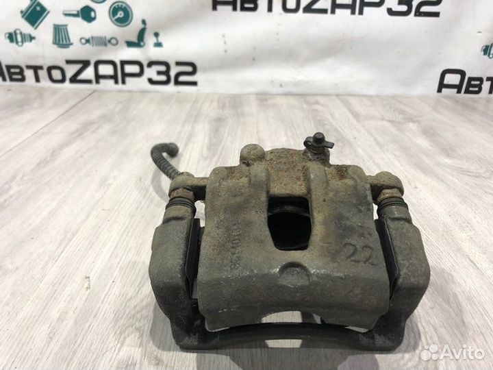 Суппорт тормозной передний левый Kia Rio 3 G4FA