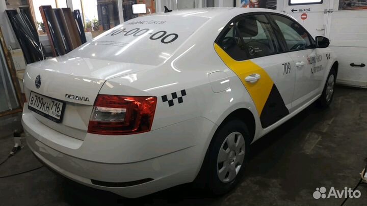 Брендирование Яндекс. Оклейка в белый цвет. Тонер