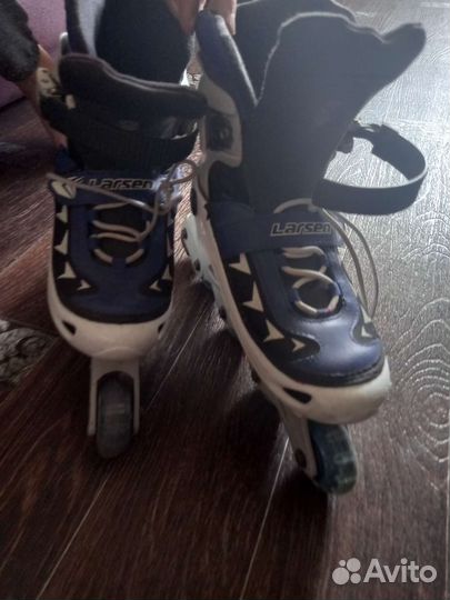 Роликовые коньки