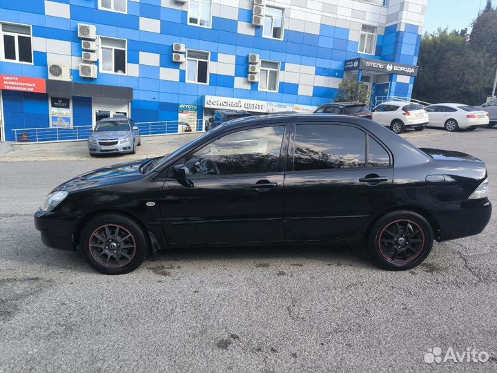 Mitsubishi Lancer 1.6 МТ, 2005, 169 000 км