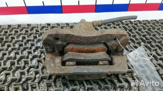 Суппорт тормозной задний правый hyundai tucson JM